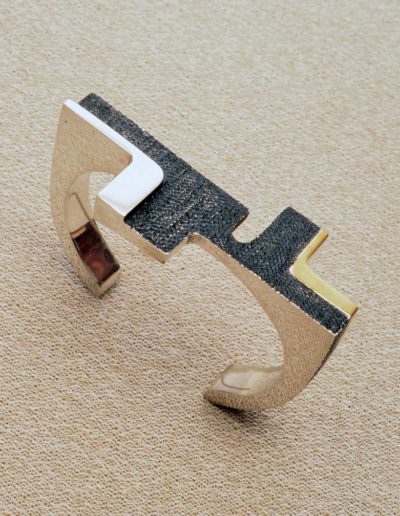 bracelet: silver, gold accents