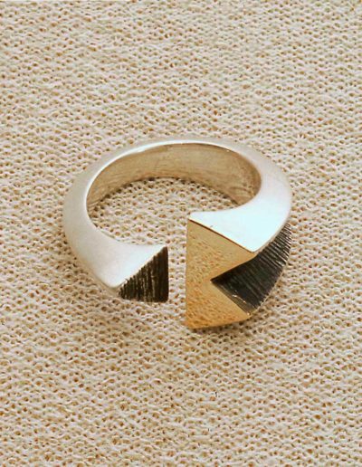ring: silver, gold accents